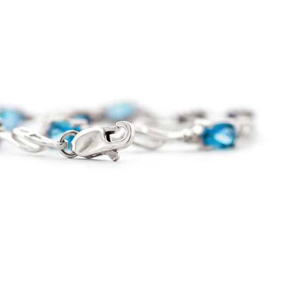 14K. GOLD TENNIS BRACELET WITH BLUE TOPAZ & DIAMONDS (White Gold) - Picture 6 of 6